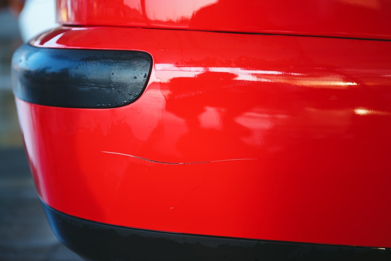 red car with scratch